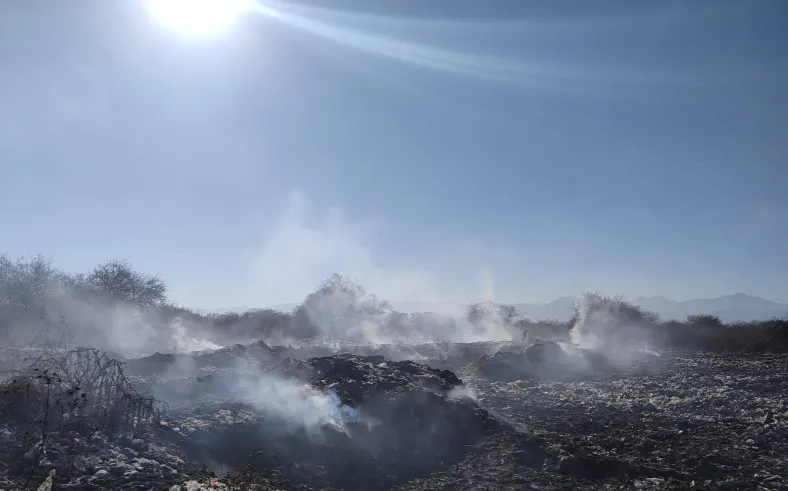 Basural a cielo abierto en El Carril